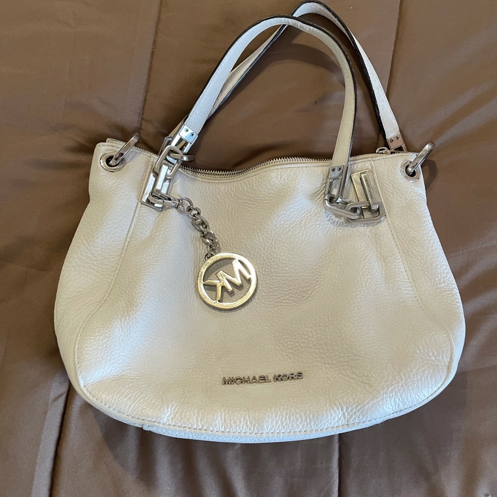 Small Michael by Michael Kors handbag.